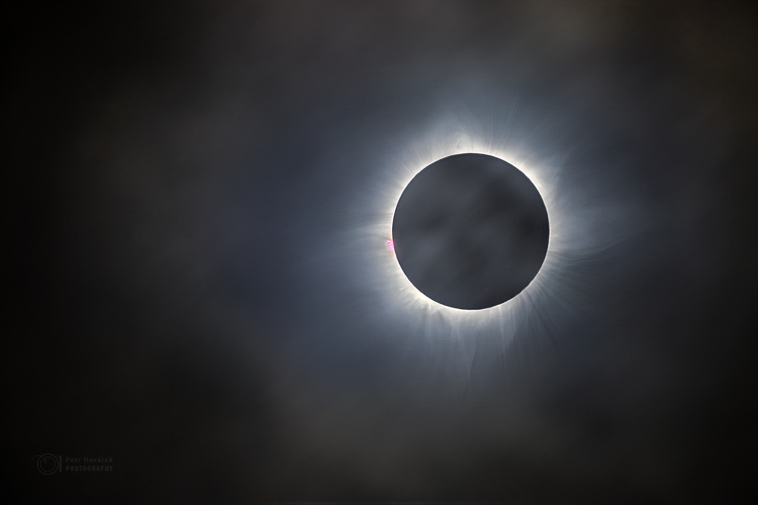 Cloudy solar eclipse… Revealed Petr Horálek Photography