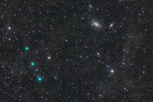 Comet ATLAS, galaxies and dust